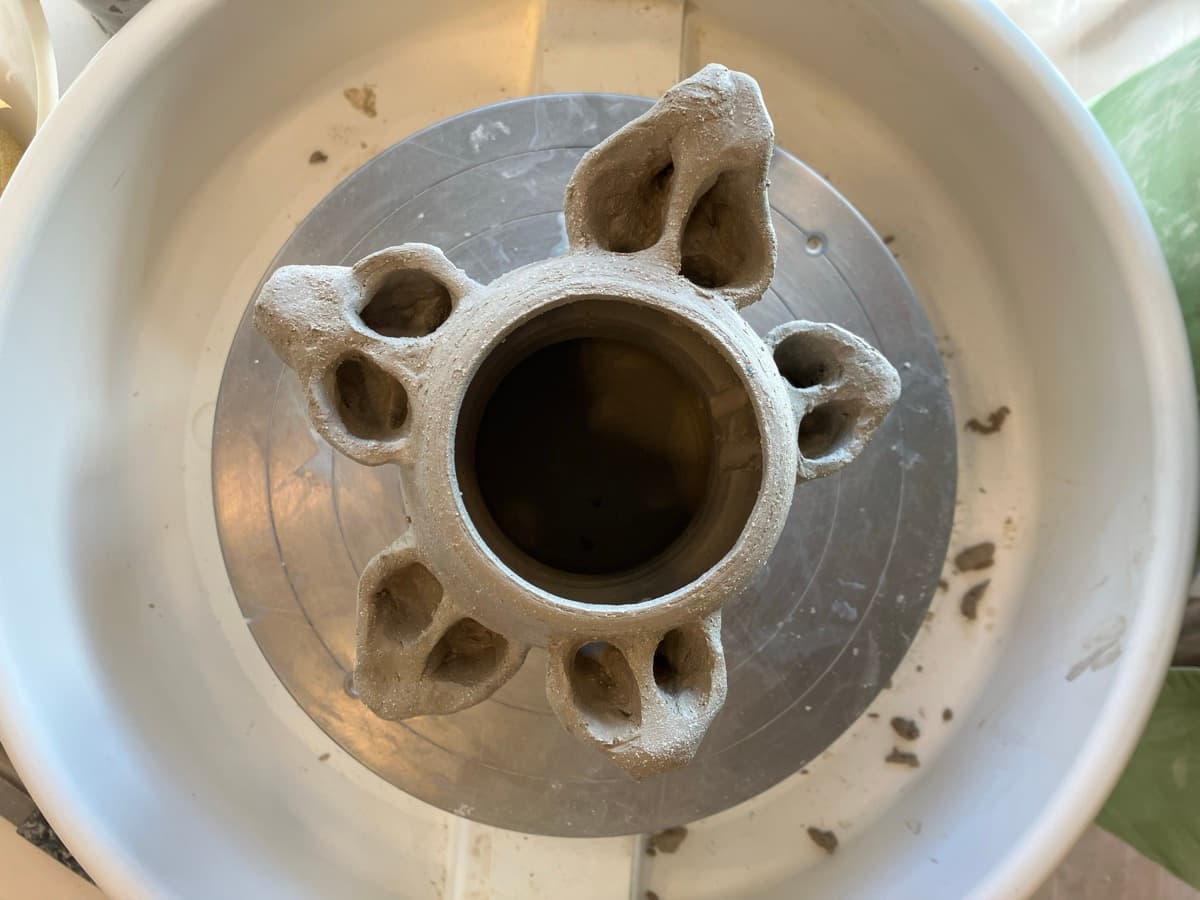 Raw clay on wheel — top view